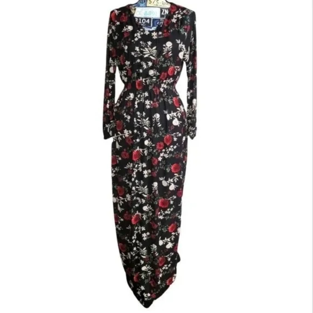 Bislife size 46 mannequin wears a small floral black and red long dress